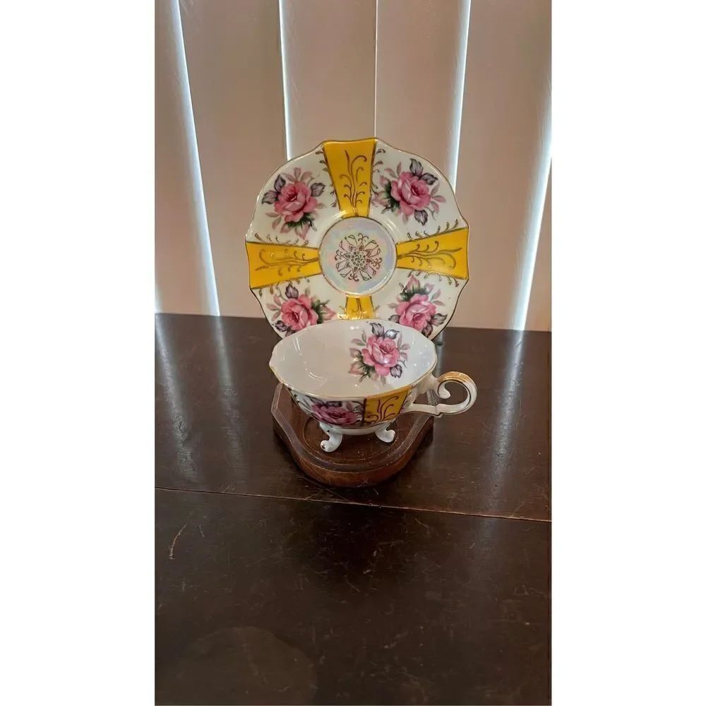 VINTAGE IRIDESCENT YELLOW TEA CUP AND SAUCER WITH ROSES